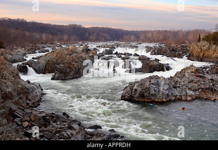 Kayakers navigating whitewater rapids at Great Falls, Potomac River, Virginia Stock Photo