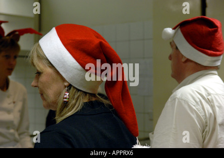 dinner ladies queue christmas dinner canteen lunch  school christmas english british education colour color horizontal inside ca Stock Photo