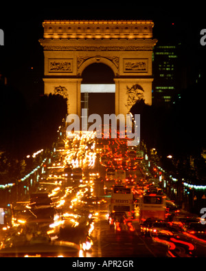 EU FR France Region Ile de France Paris 8 Arrondissement The famous Avenue des Champs Elysees and the Arc de Triomphe at night Stock Photo