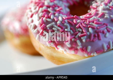 iced donuts on plate Stock Photo