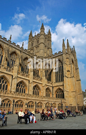 tourist sitting on seats outside bath abbey,england Stock Photo