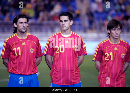 Angulo, Juanito and Silva forming before the match. Stock Photo