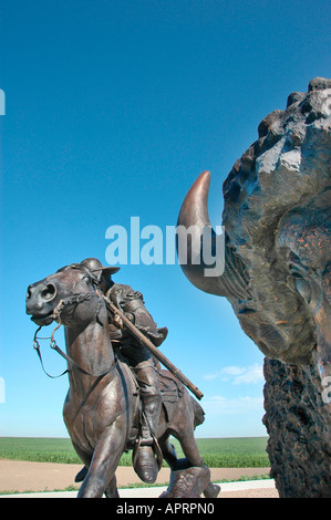 public Statue of Buffalo Bill Cody shooting a buffalo in Oakley Kansas USA  where the herds were killed by hunters by the millions for hides and meat  Stock Photo - Alamy