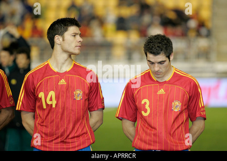 Xabi Alonso and Antoni Lopez forming before the match. Stock Photo