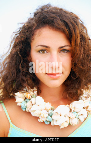 Woman wearing seashell necklace Stock Photo