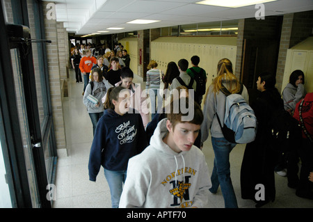 Crowds of high school students fill hallways during the exchanging of classes Stock Photo