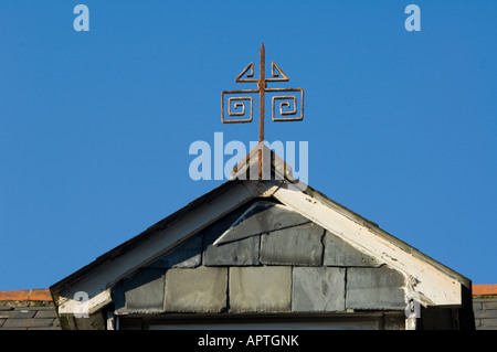 Rooftop with wrought iron ornament Farnham Surrey Stock Photo