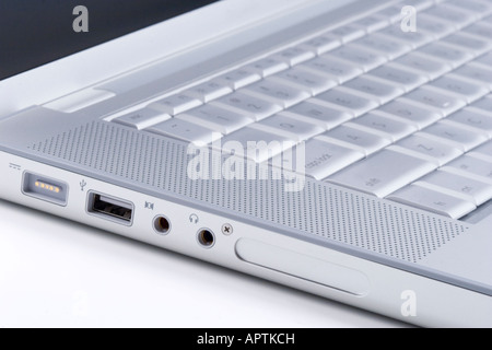 Side of laptop showing connector ports and keyboard Stock Photo