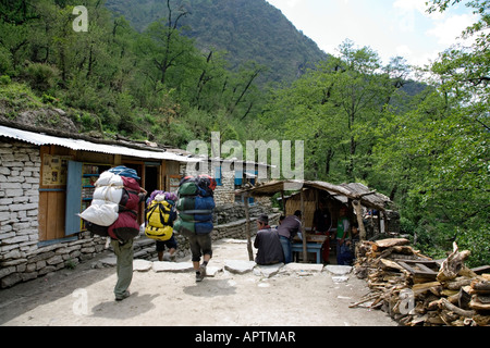 Porters. Banskot village. Annapurna circuit trek. Nepal Stock Photo