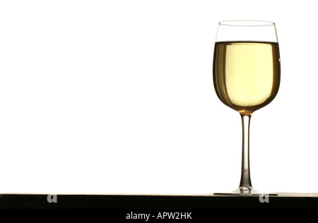 Glasses of white wine standing on table isolated on white background Stock Photo