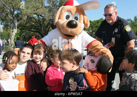 Miami Florida,Easter Seals Annual Holiday Party,Fraternal Order of Police charity child,children,dog,pet,canine,animal,pet mascot,FL121404079 Stock Photo