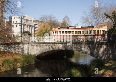 Christchurch Canterbury South Island New Zealand City Loop tourist tram crossing bridge over River Avon near city centre Stock Photo