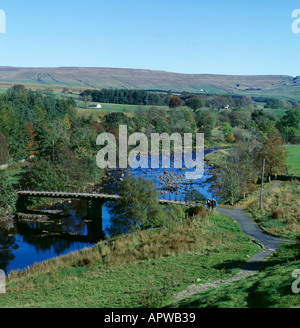 A field above the river Tees, County Durham, England. Feed for the sheep in a manger Stock Photo ...