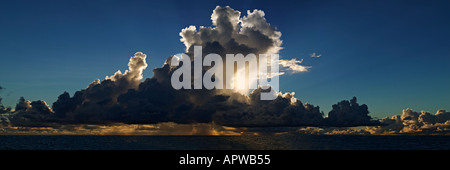 Storm clouds at sunset over ocean Seychelles Stock Photo