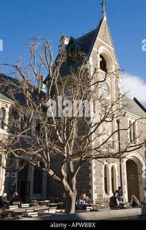 19th century Gothic revivalist Arts Centre building 1874 clock tower entrance and cafe. Christchurch Canterbury New Zealand Stock Photo