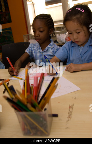 Kids in art class at After School Club Archbishop Sumner Primary School Kennington London UK. Stock Photo