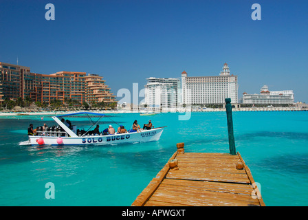 Pier and tourist boat in Cancun hotel area, Quintana Roo State, Mexico, North America Stock Photo