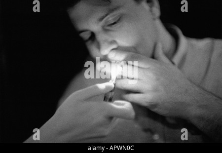 Man smoking a cigarette Stock Photo