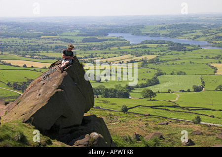 Climber on the Roaches, view towards Tittesworth Reservoir, Peak District National Park, Staffordshire, England Stock Photo