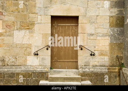 Wooden doorway in Benedictine abbey church of Sainte Marie Madeleine, Vezelay, Burgundy, France Stock Photo