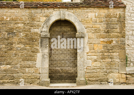 Wooden doorway in Benedictine abbey church of Sainte Marie Madeleine, Vezelay, Burgundy, France Stock Photo