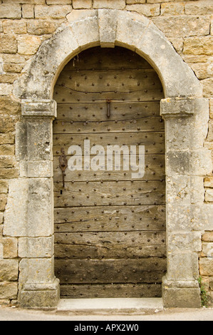 Wooden doorway in Benedictine abbey church of Sainte Marie Madeleine, Vezelay, Burgundy, France Stock Photo