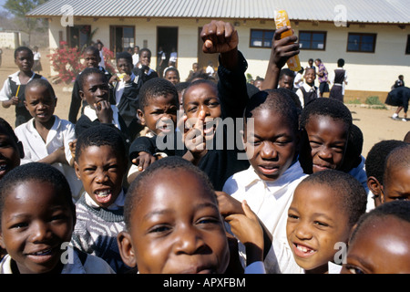 Boisterous Tswana children outside a school in Kasane Stock Photo