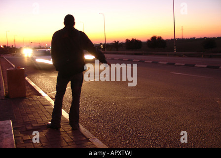 Hitchhiker in the suburbs of the city of Sderot southern Israel Stock Photo