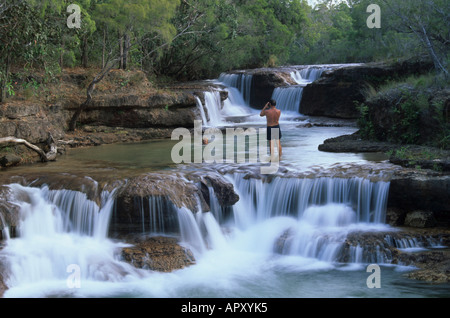 Swimming at Twin Falls waterfall, Australien, Qld, Telegraph Road, Jardine River NP, Cape York Peninsula Stock Photo