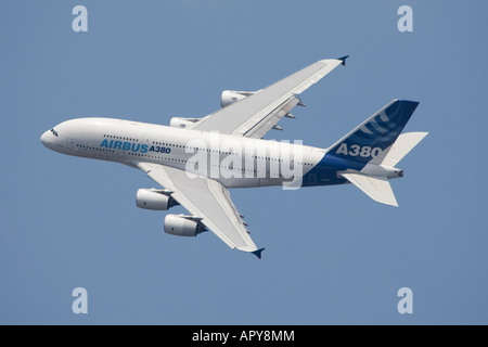 Airbus A380 superjumbo new technology advanced biggest passenger commercial plane in the world blue sky Stock Photo