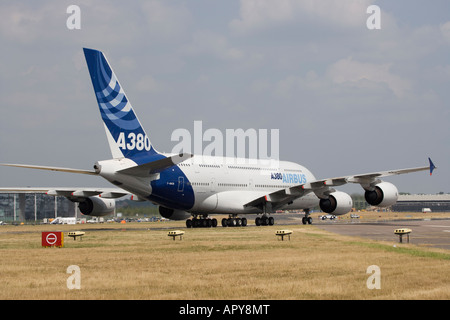 Airbus A380 superjumbo new technology advanced biggest passenger commercial plane in the world blue sky Stock Photo