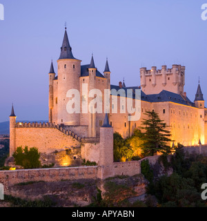 Segovia, Castile and León, Spain. The Alcázar illuminated at dusk. Stock Photo