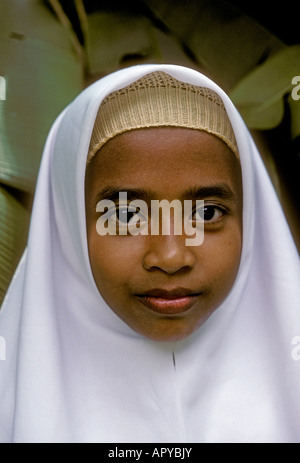 1, one, Malaysian girl, Malay girl, student, headshot, head shot, eye contact, front view, madrasa school, Islamic school, Kuala Lumpur, Malaysia Stock Photo