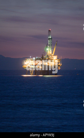 Nighttime image of an oil rig off the coast of California. Stock Photo