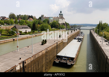 A freight ship in the water gate of the water power plant, Ybbs Persenbeug, Lower Austria, Austria Stock Photo