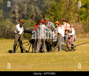 Troops firing a cannon at Civil War Re enactment Stock Photo
