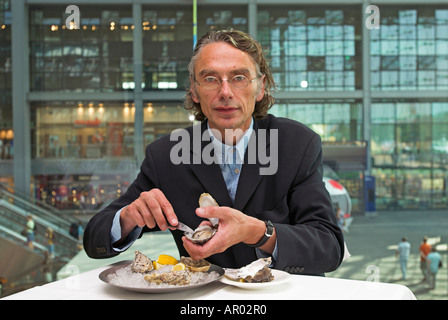 Gastronomer Josef Diekmann in his Restaurant Austernbar in the central train station of Berlin, Germany Stock Photo