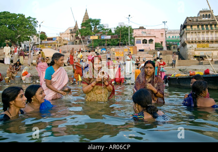 Ritual morning bath. Assi Ghat. Ganges river. Varanasi. India Stock Photo