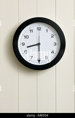 wall clock showing time at half past three thirty 0330 1530 Stock Photo
