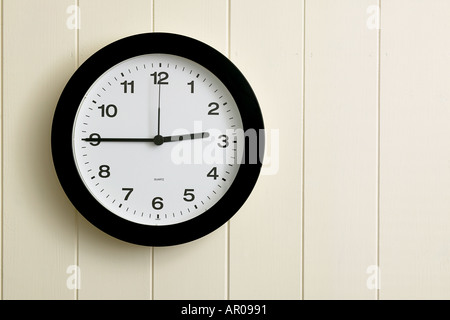 wall clock showing time at quarter to three 0245 1445 Stock Photo