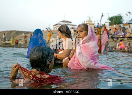 Ritual morning bath. Assi Ghat. Ganges river. Varanasi. India Stock Photo