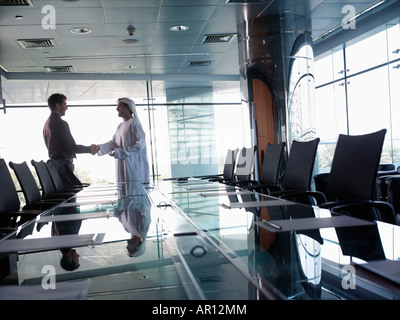Business persons shaking hands Stock Photo