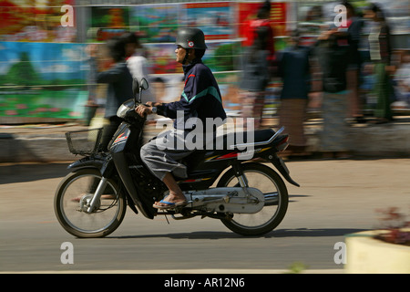 German helmet and symbols, Taunggyi, Burmese man with German military wehrmacht helmet with Swastika and eagle, mistaken as Budd Stock Photo