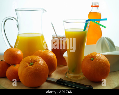 pitcher and a glass of orange juice Stock Photo - Alamy