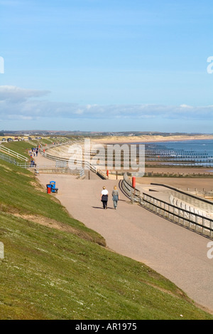 dh Seafront BEACH ABERDEEN People walking along promenade scotland landscape beaches coast Stock Photo