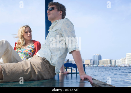 Couple on Abra at Dubai Creek, United Arab Emirates Stock Photo