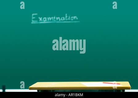 Paper and pencil on table during examination Stock Photo