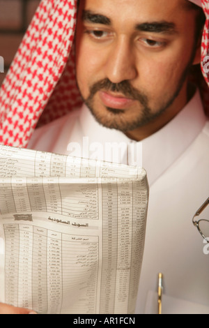 Arab Man reading the newspaper Stock Photo