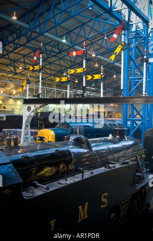 British semaphore stop and distant signals on display in the Great Hall of the National Railway Museum, York. UK Stock Photo