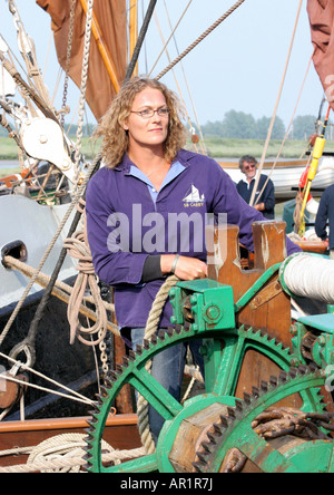 Crew from the SB. Cabby tidying ropes after the Blackwater barge match. Maldon Quay Essex Stock Photo